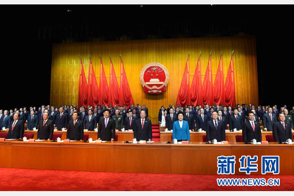 10月1日，慶祝中華人民共和國成立66周年暨新疆維吾爾自治區成立60周年大會在新疆人民會堂隆重舉行。 新華社記者 饒愛民 攝