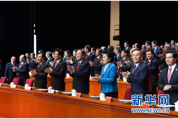 10月1日，慶祝中華人民共和國成立66周年暨新疆維吾爾自治區成立60周年大會在新疆人民會堂隆重舉行。 新華社記者 饒愛民 攝 