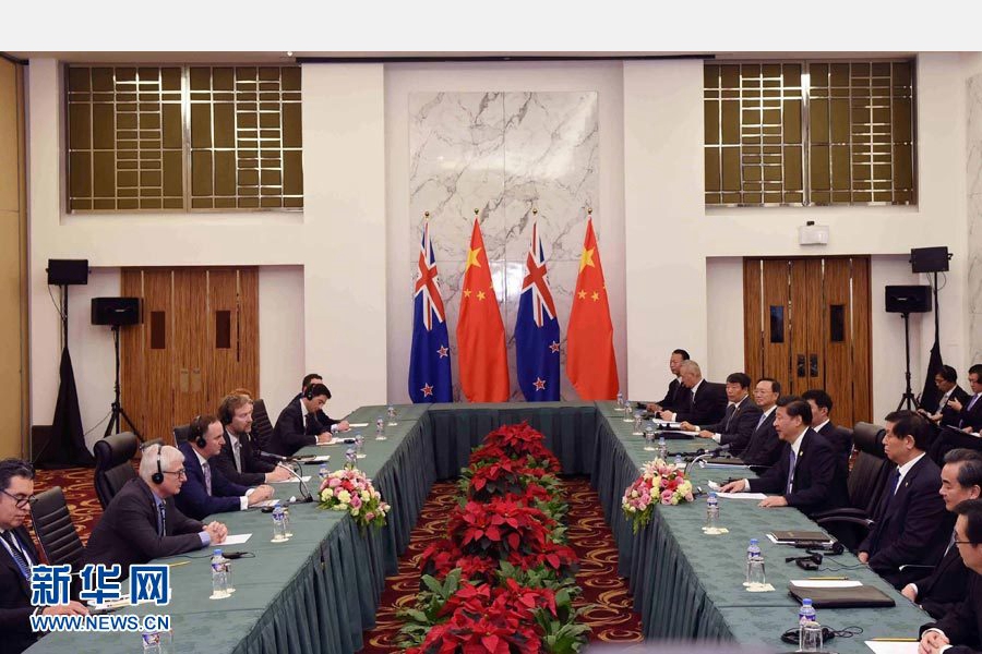 11月18日，國家主席習近平在菲律賓馬尼拉會見新西蘭總理約翰·基。 新華社記者 饒愛民 攝