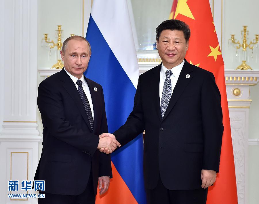 6月23日，國(guó)家主席習(xí)近平在烏茲別克斯坦塔什干會(huì)見俄羅斯總統(tǒng)普京。新華社記者李濤攝